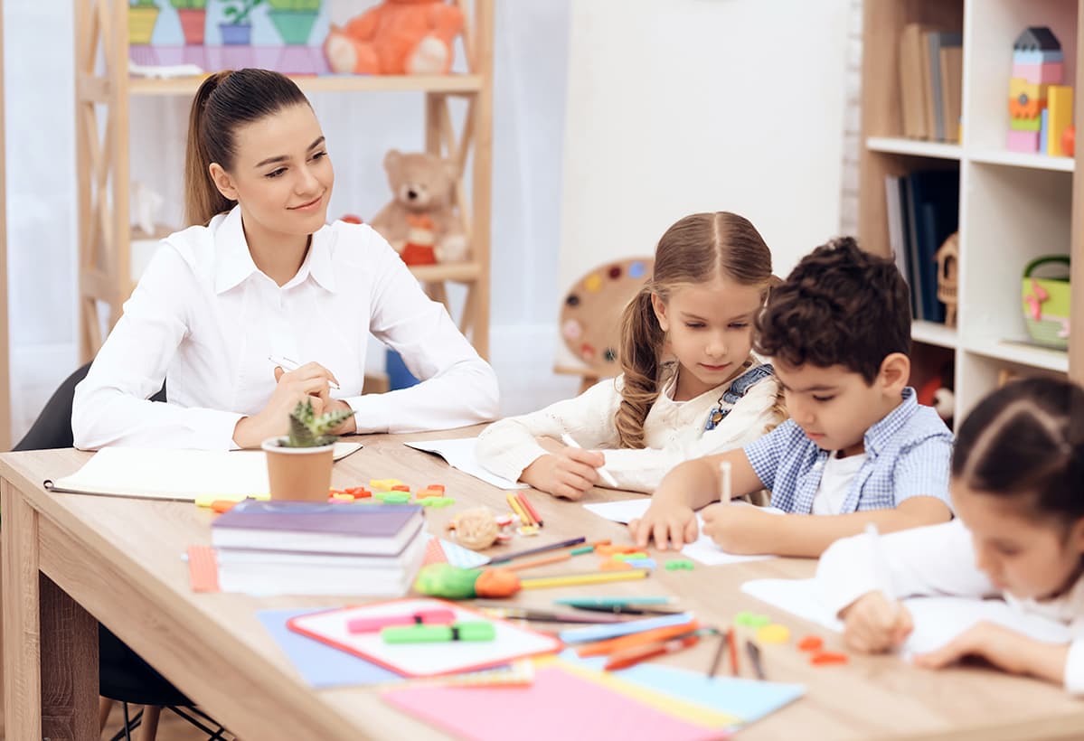 Certified instructor guiding children in a safe, supervised learning environment